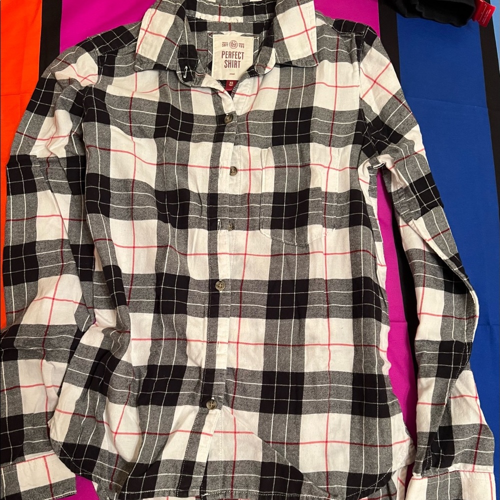 black and white plaid shirt with small red stripes